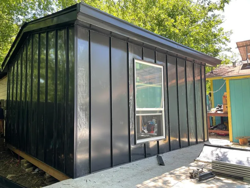 Black standing seam metal wall panels for Metal Roof Installation in Allouez