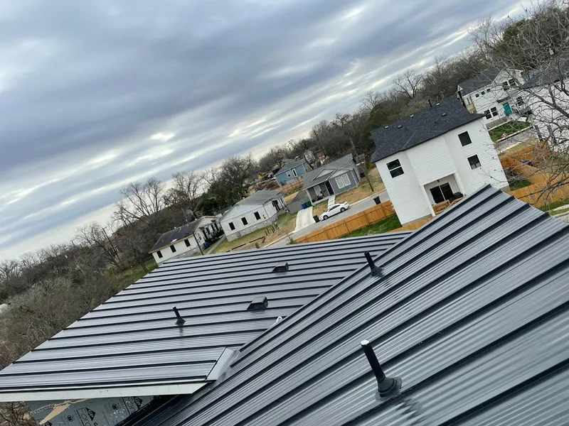 Standing seam metal roof panels with vents for Skylight Repair in Allouez